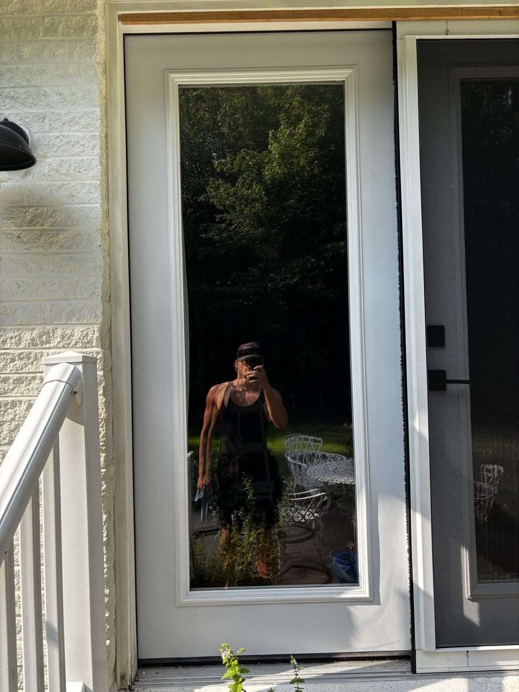 After — sidelight glass beside the front door
