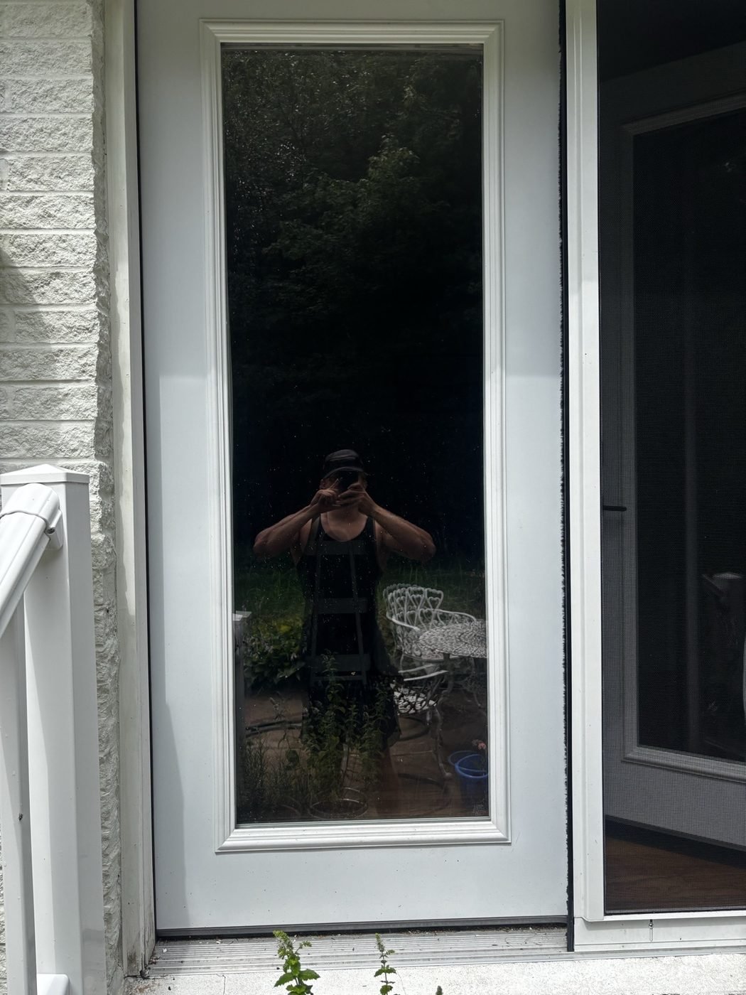 Before — sidelight glass beside the front door
